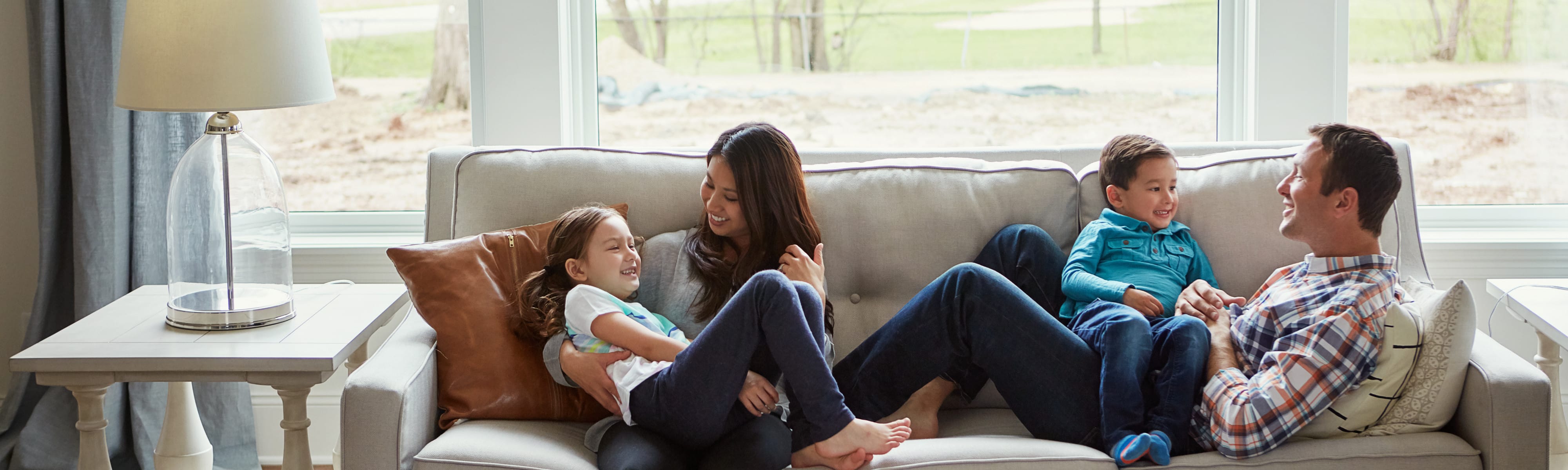 Family on the couch staying warm.