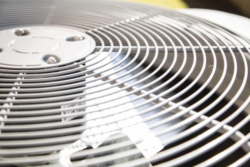 Top view of an air conditioner unit outdoors in hot summer season. No people.