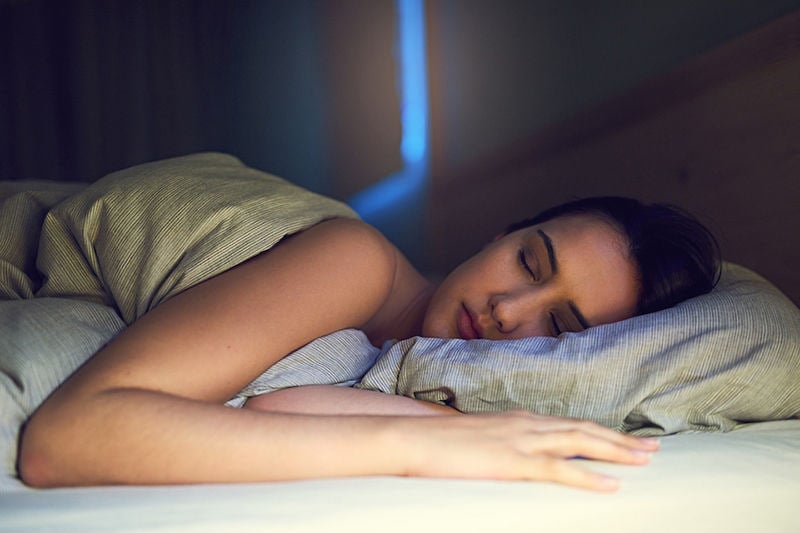 Woman Sleeping Happily|Desperate girl suffering insomnia trying to sleep.