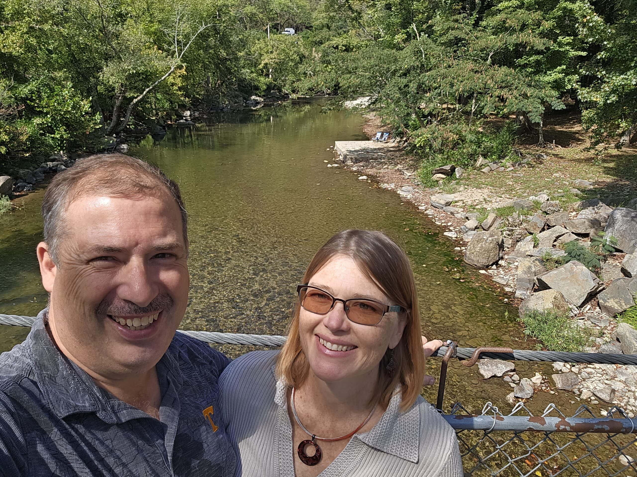 A&L HVAC & Plumbing owners; Aaron and Linnea Sweetwood, on bridge at Bicentennial Greenbelt Park in Maryville, Tennessee.