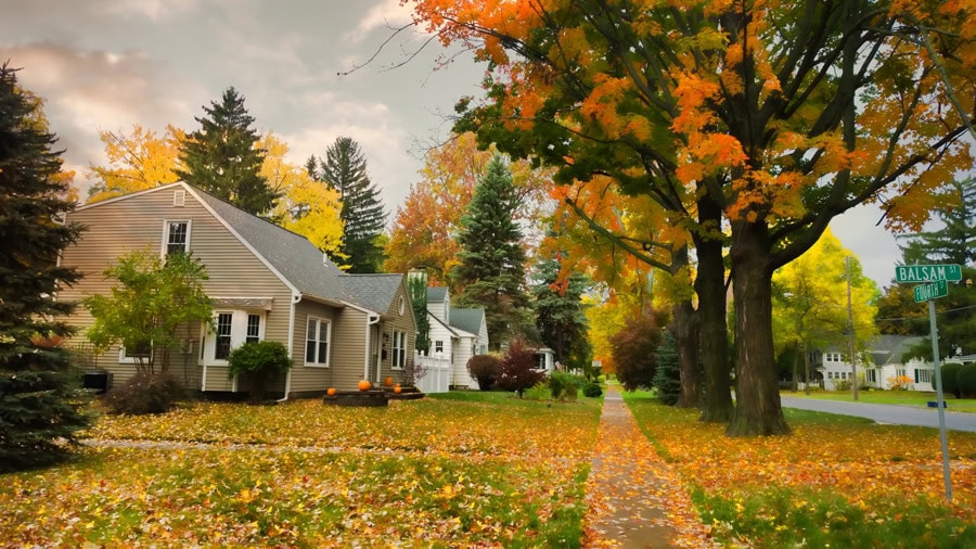 Quiet street in autumn. Fall HVAC Maintenance