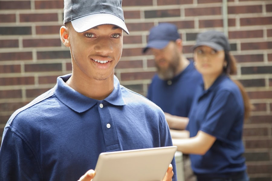 HVAC technician waiting to repair and air conditioner in Maryville